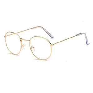 Glasses made out of thin alloy material in a bright gold finish. The material is smooth and the lens are transparent.