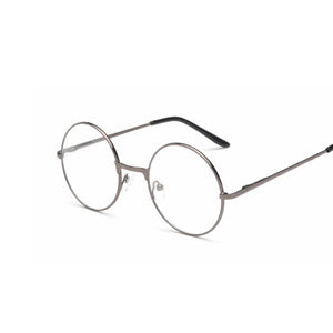 Thin silver glasses made out of alloy material, with a very simple and clean design. The lens is transparent.