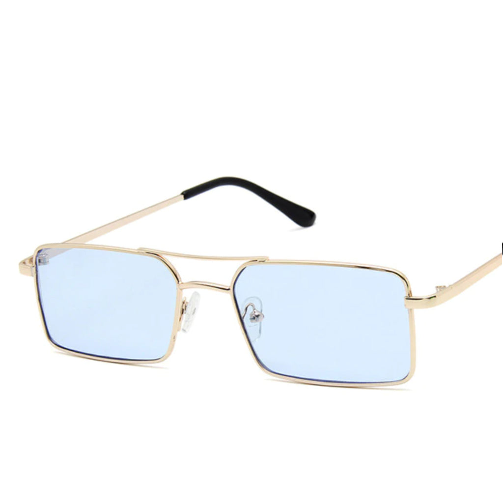 Sunglasses with a thin build and rectangle-shaped lens. The frame is gold and has a simple line connecting two parts at the top and in the middle of the lens. The colour of the lens is a light shade of blue.