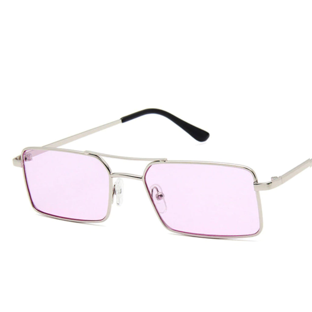 Sunglasses with a thin build and rectangle-shaped lens. The frame is silver and has a simple line connecting two parts at the top and in the middle of the lens. The colour of the lens is a light shade of pink.