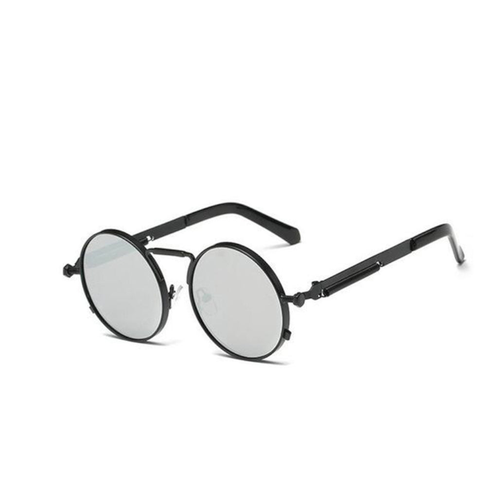 A round pair of sunglasses with a black ring-shaped frame around the lens. With a thin design around the handles and a thin line between the top lens. The lens is a tint of silver.